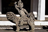 Bangkok Wat Arun - the gallery is lined all around with beautiful statues of chinese figures. 